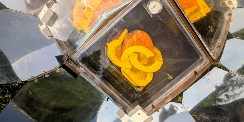 Gete Okosomin Heirloom Squash cooking in a Sun Oven.